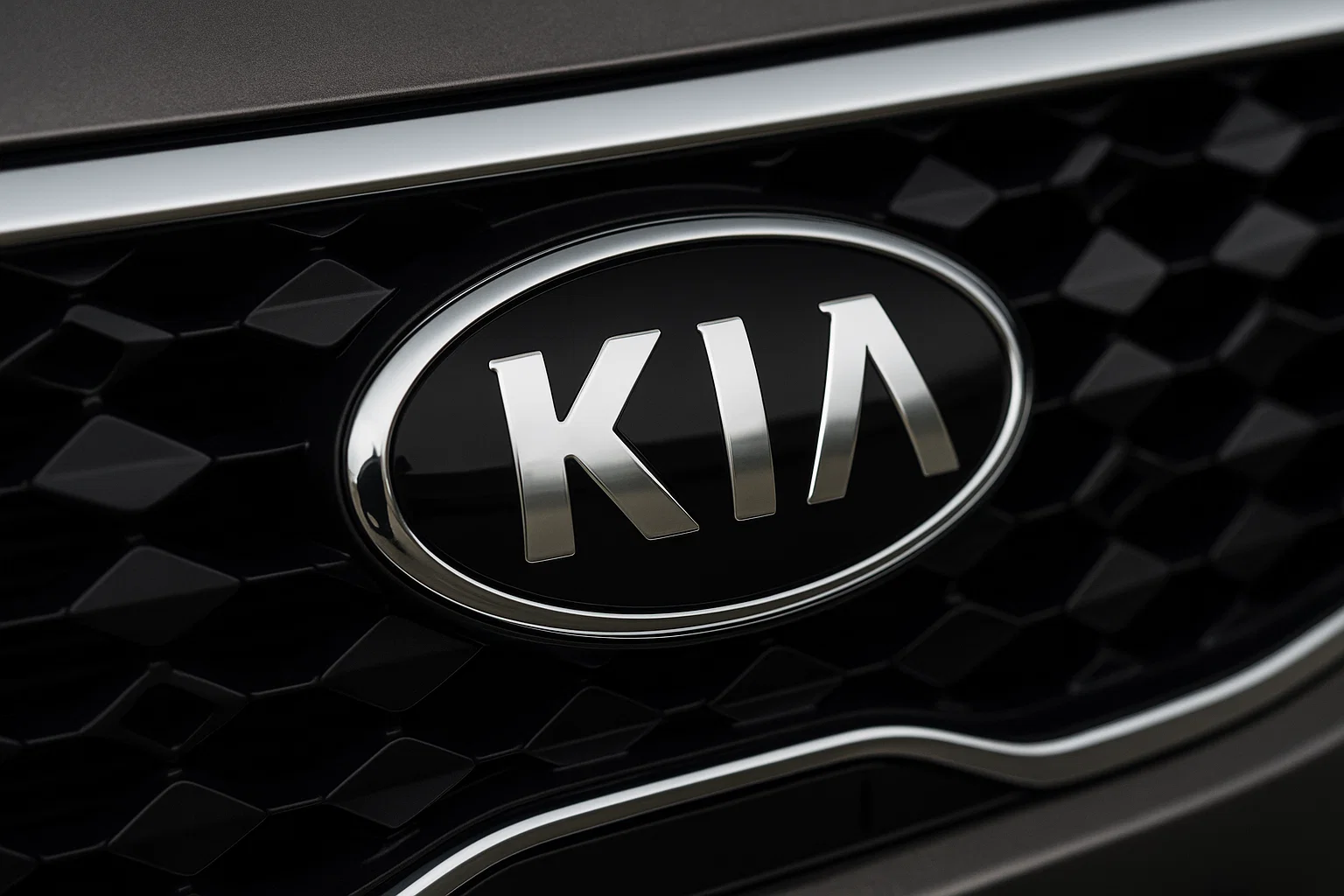 Insignia de Kia en la parrilla de un coche
