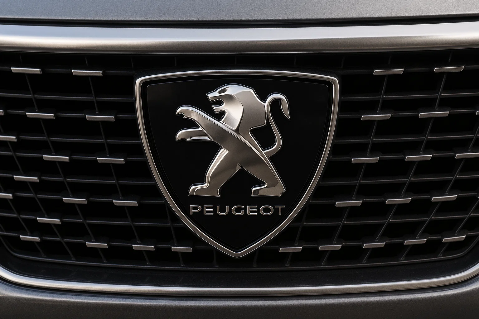 Insignia de Peugeot en parrilla